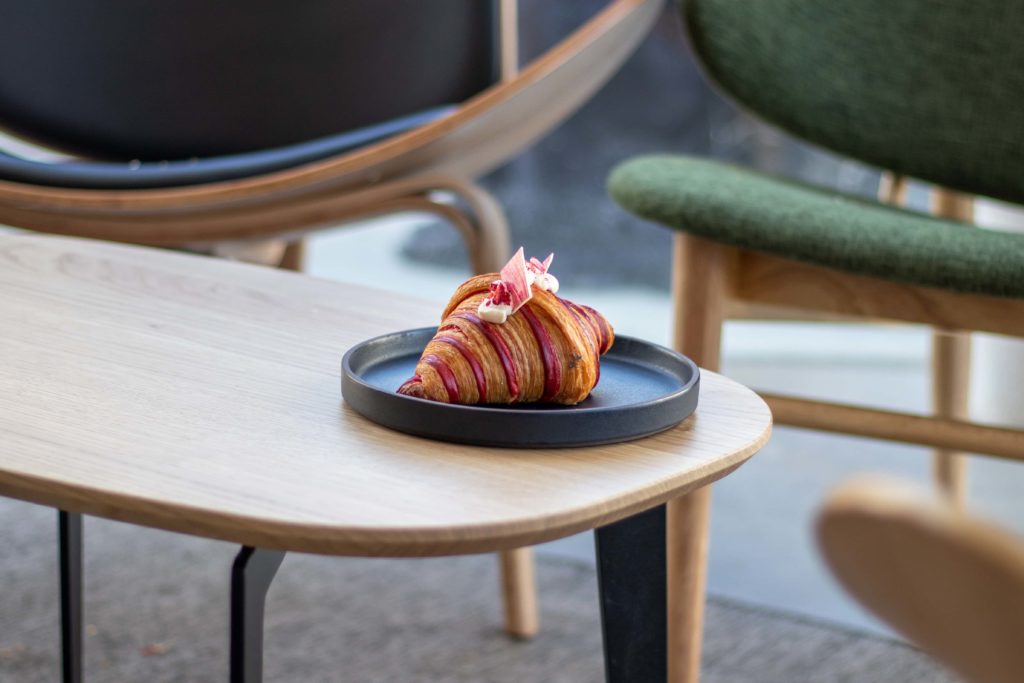 Strawberry croissant on table