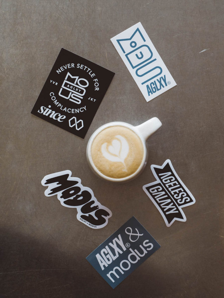 Latte on table with stickers