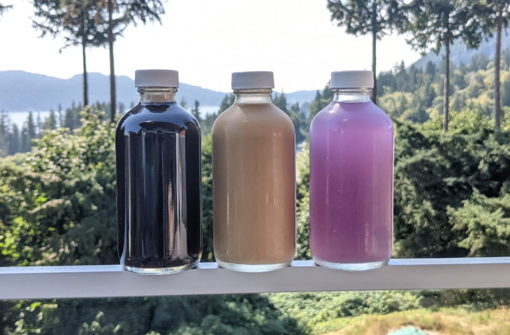 Cold brew coffee, iced latte and tea in bottles that you drink during Coffee Tasting Virtual Events