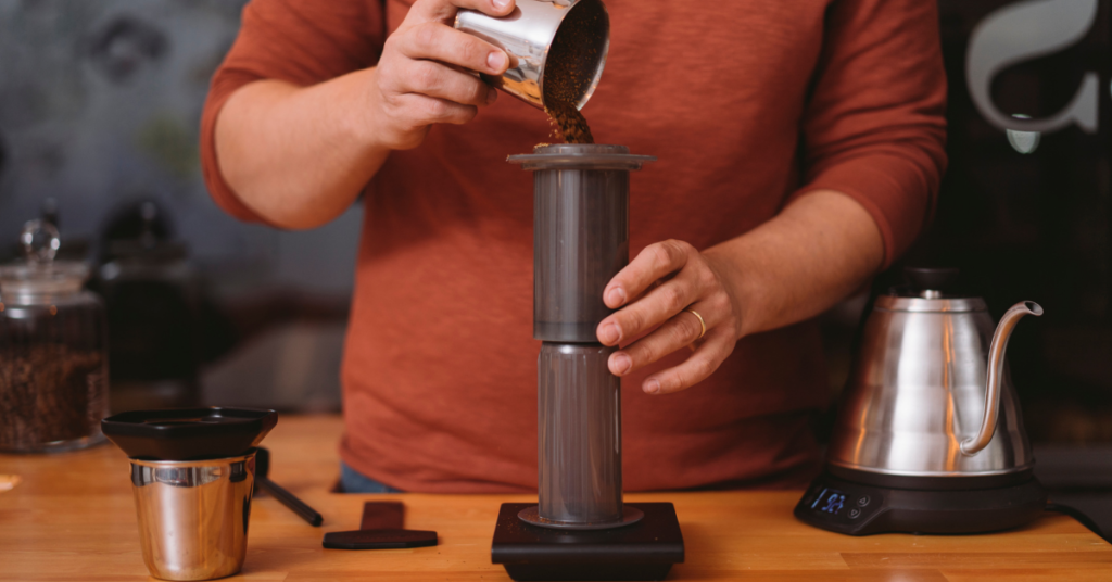 The Aeropress brewer having coffee poured into it