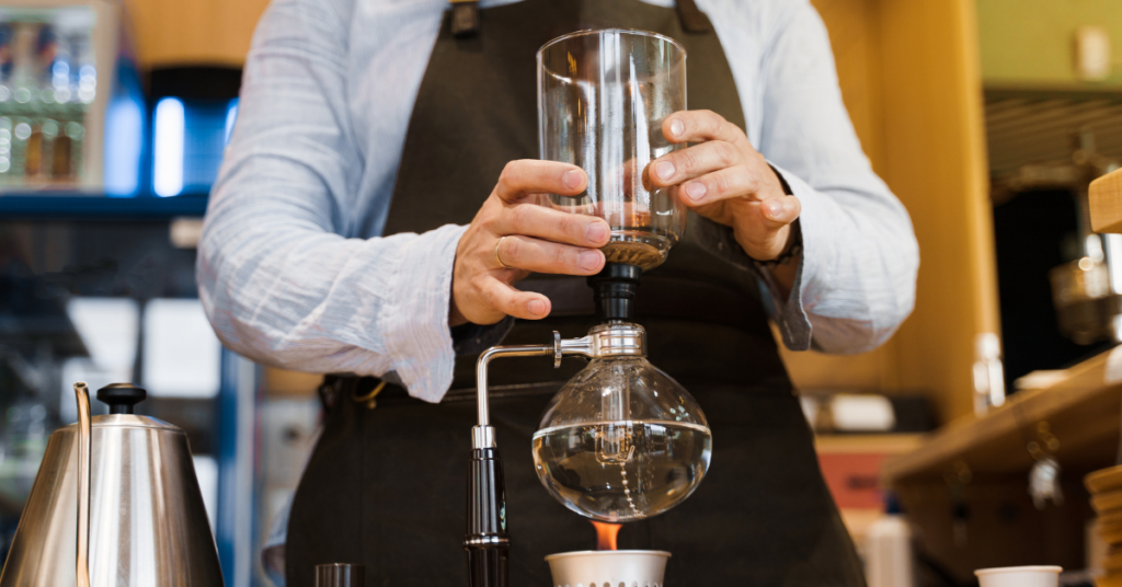 A Syphon coffee brewer being used to help decide Which coffee brewing method should I use?